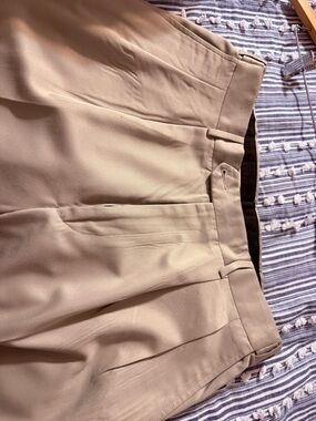 Tan men’s pleated khakis